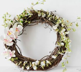 s 31 fabulous wreath ideas that will make your neighbors smile, Create a tropical grapevine based wreath