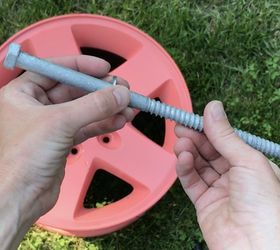 tire rim water hose holder