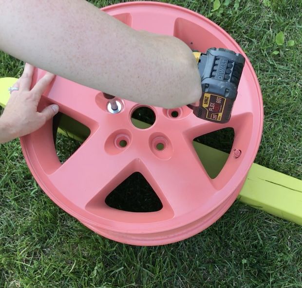 tire rim water hose holder