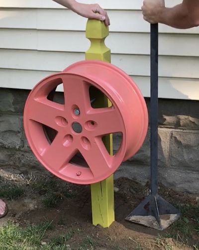 tire rim water hose holder