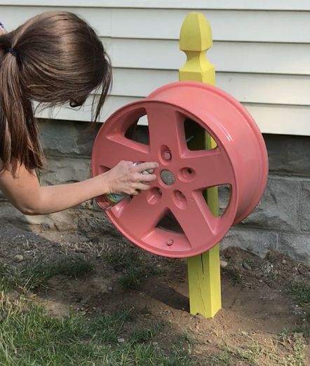 tire rim water hose holder