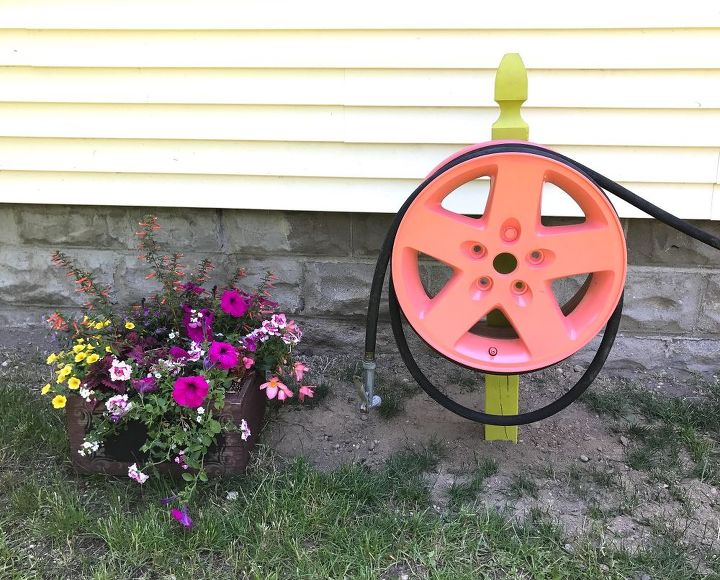 tire rim water hose holder