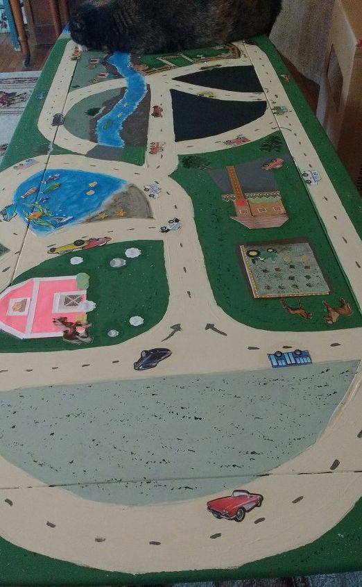 turn a dumpster coffee table into a child s personalized play table, When painting is complete add fun details