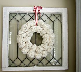 s 10 wreath ideas to brighten up your front door, Cut Yarn Into A Pom Pom Wreath