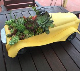 s 15 spunky ways to transform your boring af planters, Transform A Thrifted Car Into A Planter