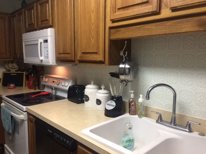 s 31 update ideas to make your kitchen look fabulous, Use textured wallpaper for a cool backsplash