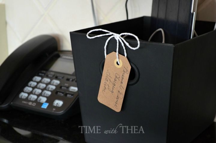 s 33 space saving storage ideas that ll keep your home organized, Paint a cardboard bin into a charging station