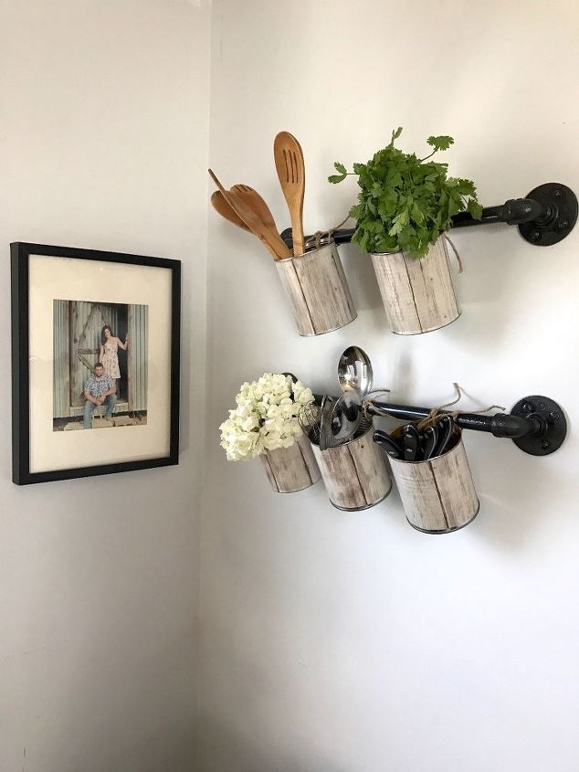s 33 space saving storage ideas that ll keep your home organized, Craft Hangers For Herbs With Cans