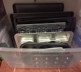 31 space saving storage ideas that ll keep your home organized, Organize your cookie sheets in a plastic bin