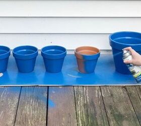 turn terra cotta pots blue for the cutest porch idea