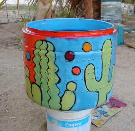 tambor de lavadora reciclado convertido en arte de jardn