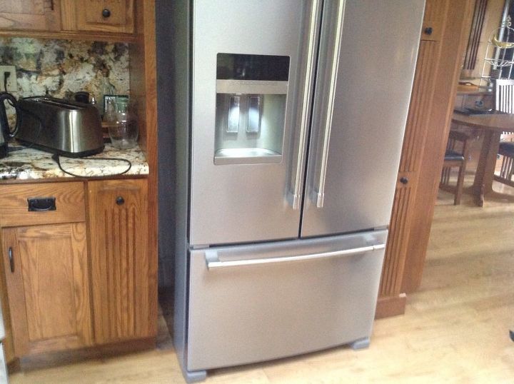 camouflage space around new refrigerator was a large built in fridge