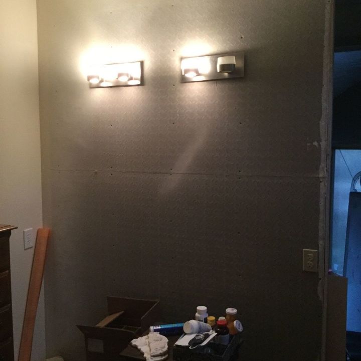 when tiling a wall in a bathroom how do you get a finished edge look