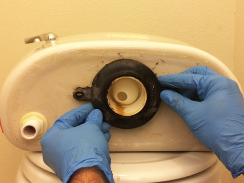how to fix a toilet leaking from the tank bolts
