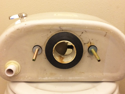 how to fix a toilet leaking from the tank bolts