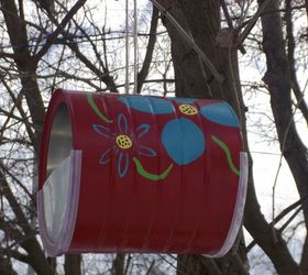 s save your old cans for these 30 home decor ideas, Make a pretty bird feeder