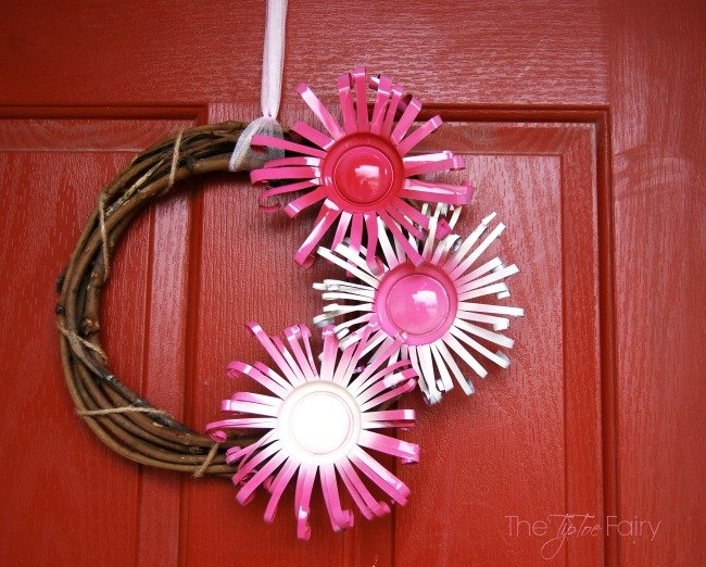 s save your old cans for these 30 home decor ideas, Cut them into wreath flowers