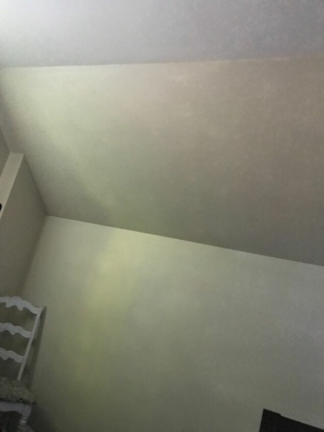 q do you wallpaper the ceiling in angled room