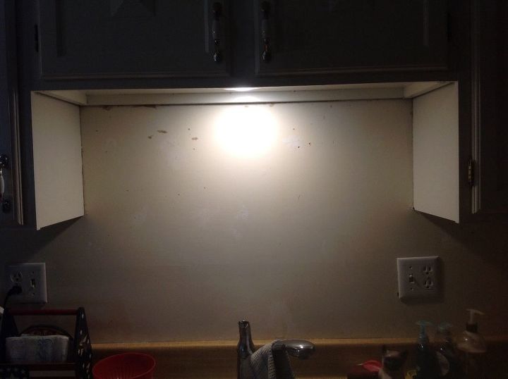 q i want to put a piece of glass over my sink under the cupboard above