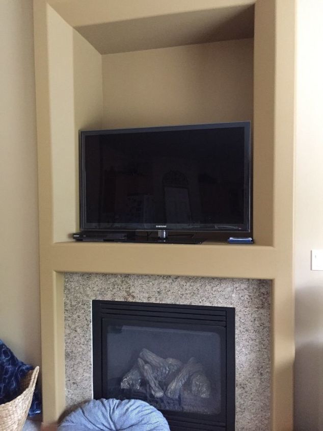 what is the best way to deal with an tv hole above fire place