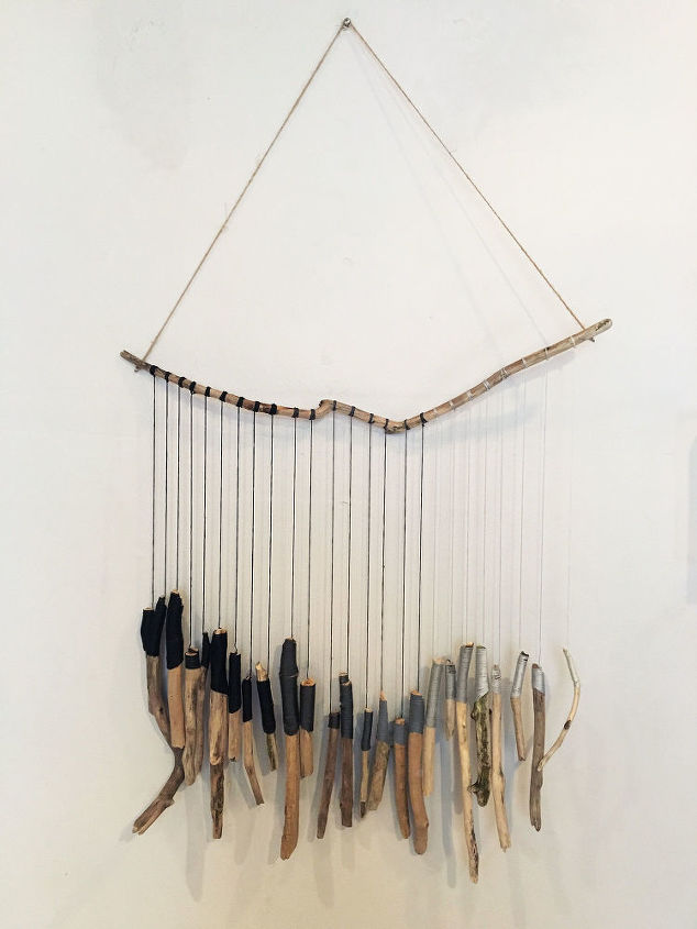 s 15 gorgeous bohemian inspired decor items to make for yourself, Hang Painted Driftwood For Decoration