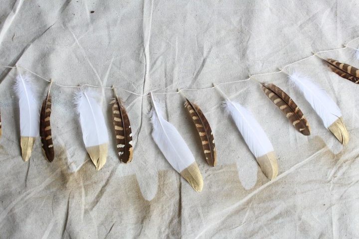 s 15 uncanny hacks for making pretty garland decor, Dip Feathers In Gilded Gold
