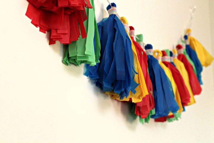 s 15 uncanny hacks for making pretty garland decor, Snip Tablecloths Into Tassels