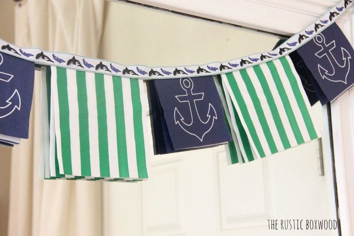 s 15 uncanny hacks for making pretty garland decor, Fold Napkins Into A Banner