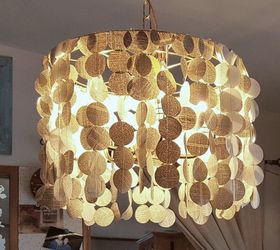 s 15 uncanny hacks for making pretty garland decor, Cut Up Your Book Into A Garland Chandelier