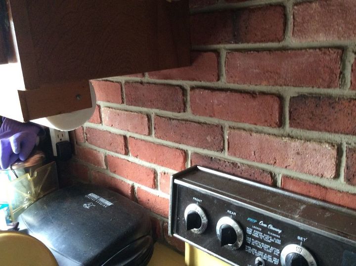 q need new backsplash for current uneven brick one