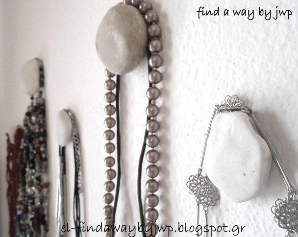 s 30 jewelry organizing ideas that are better than a jewelry box, These pretty pebbles on your wall