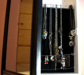 s 30 jewelry organizing ideas that are better than a jewelry box, This hidden jewelry cabinet with a mirror