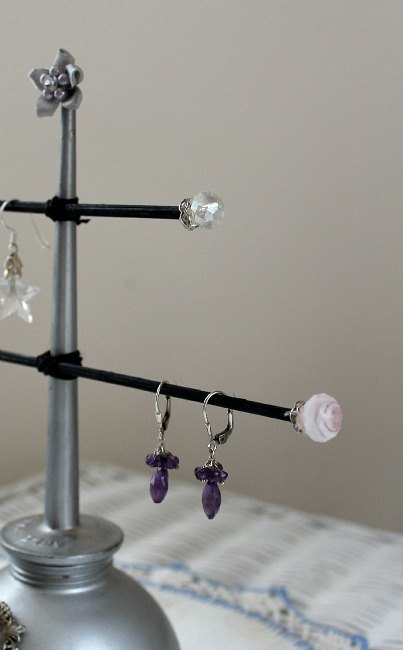 s 30 jewelry organizing ideas that are better than a jewelry box, This reused vintage oil can and skewers