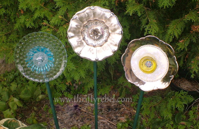 s 30 brilliant things you can make from cheap thrift store finds, Flowered plates to garden decor