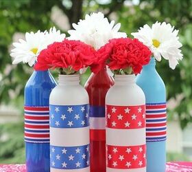 s 30 adorable diy ideas for july 4th, Upcycle bottles into bursting flower displays