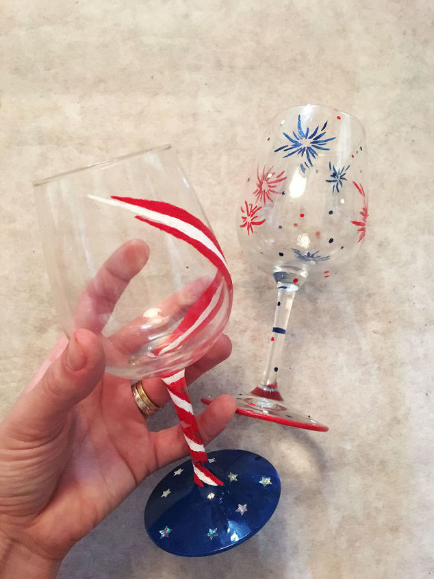 s 30 adorable diy ideas for july 4th, Paint wine glasses with bursts of fireworks