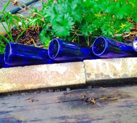 30 unbelievable backyard update ideas, Line your garden space with beer bottles