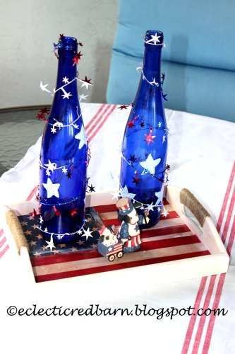 s 10 patriotic projects perfect for your fourth of july party, Wrap Tinsel On Wine Bottles