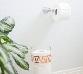 turn a glass vase into chic toilet paper storage