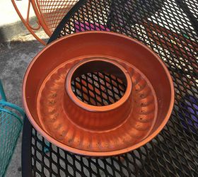 an old copper jello mold gets a new use in the backyard