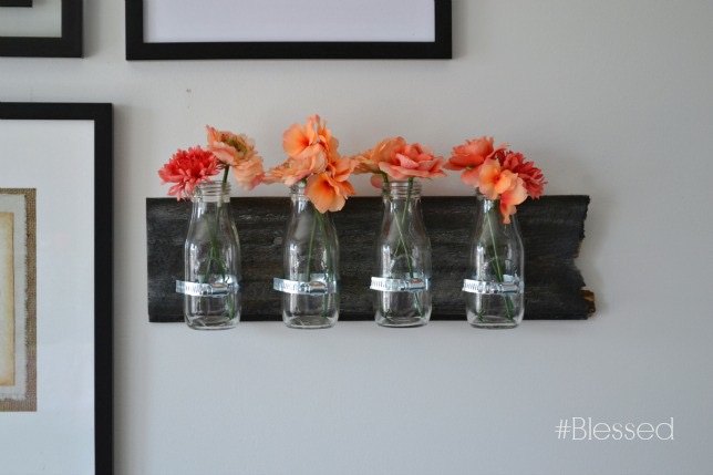 31 creative ways to fill empty wall space, Infuse color with hanging flower vases