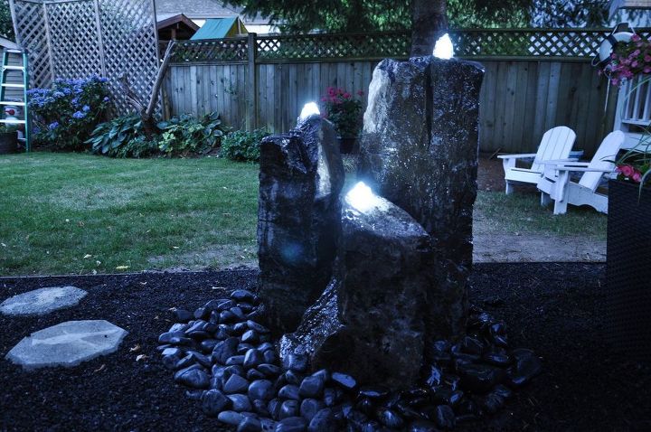 30 neat ideas to upgrade your backyard, Add a stunning water feature to your backyard