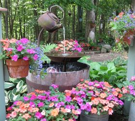 31 creative garden features perfect for summer, Upcycle a teapot into a rustic fountain