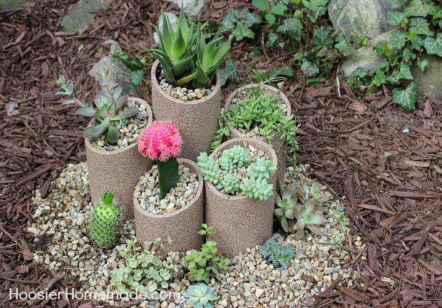 31 creative garden features perfect for summer, Add some spray painted PVC planters
