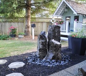 31 creative garden features perfect for summer, Make a rocky backyard fountain