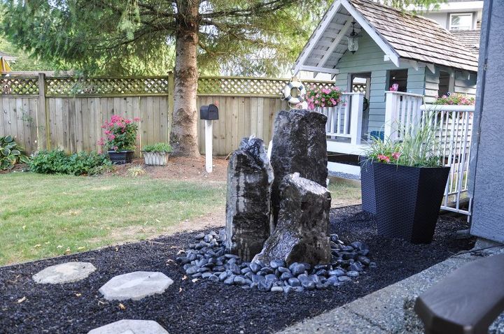 31 creative garden features perfect for summer, Make a rocky backyard fountain