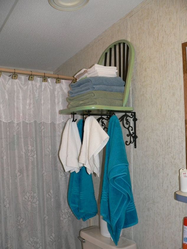 s jazz up your bathroom with these 30 stylish additions, Revamp A Broken Chair Int A Unique Hanger