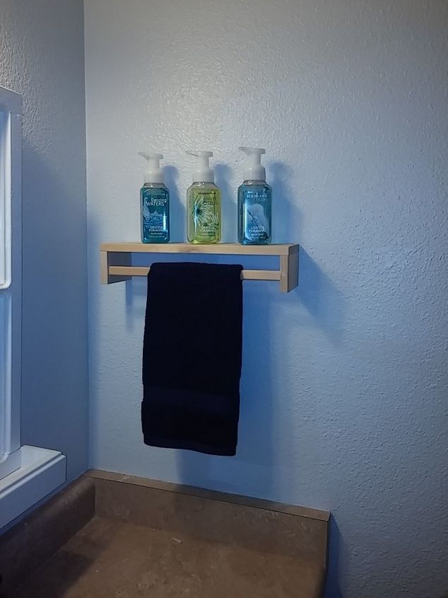 s jazz up your bathroom with these 30 stylish additions, Transform A Common Spice Rack Into Hanger