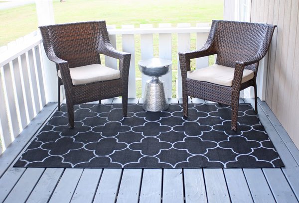 s 10 quick and easy rug ideas to brighten up your space, Decorate Your Patio With A Custom Rug