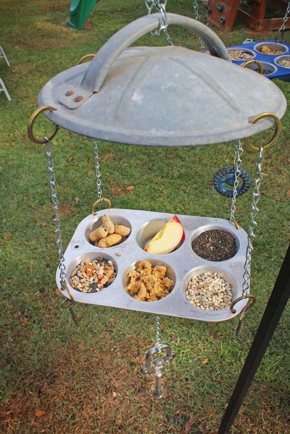 31 clever ideas to reuse muffin pans and cupcake liners, Hang A Buffet For Birds